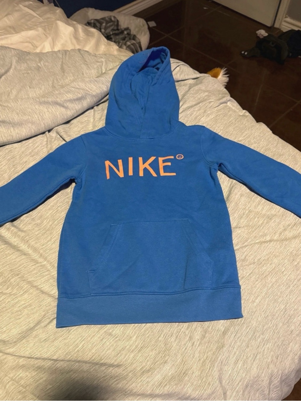 Nike Kids Blue Hoodie with Orange Logo